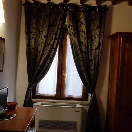 Tuscany بيت ضيافة